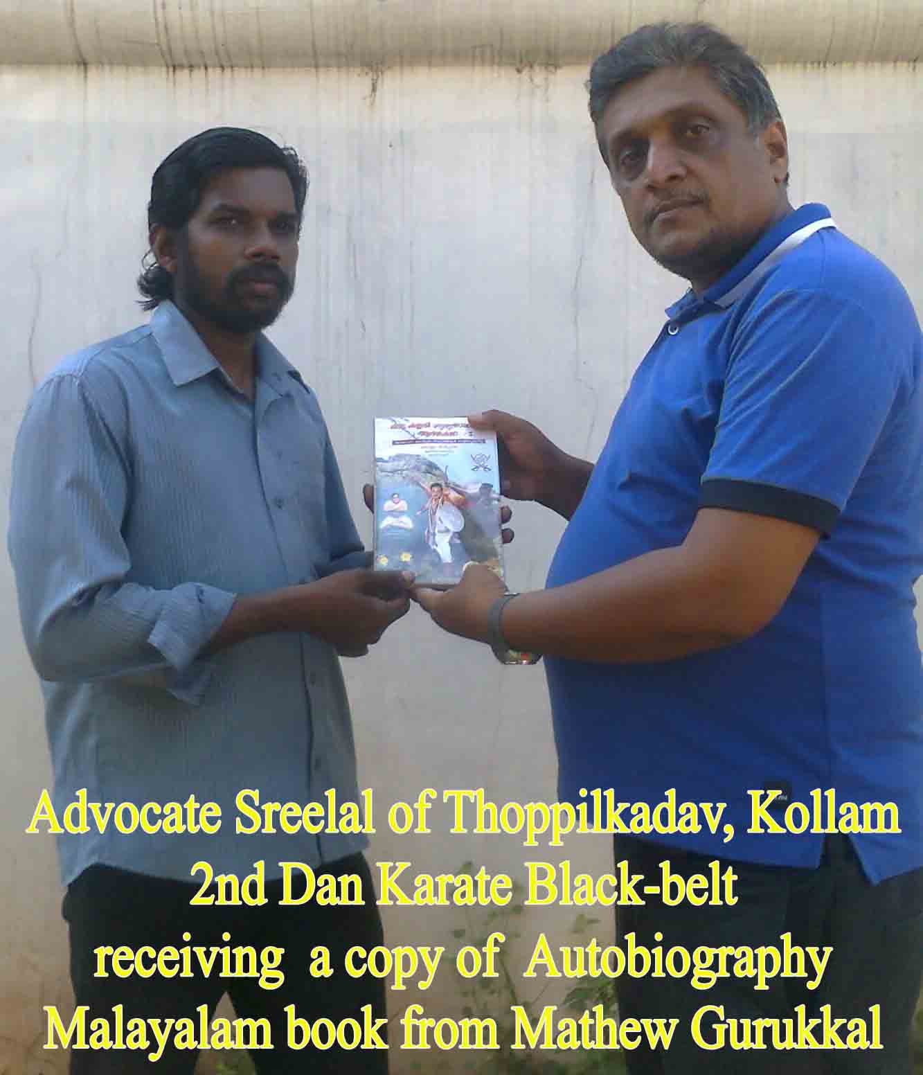 Mathew gurukkal giving a copy to Advocate Sreelal, kollam
