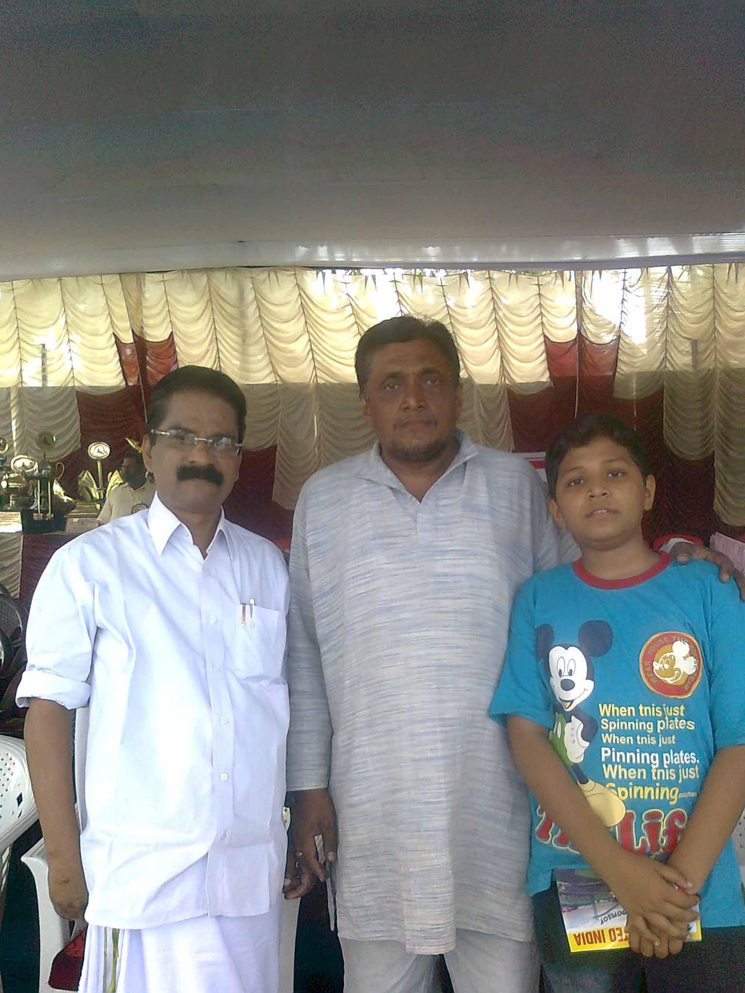 MLA Sadasivan standing with Mathew Gurukkal & Shelly