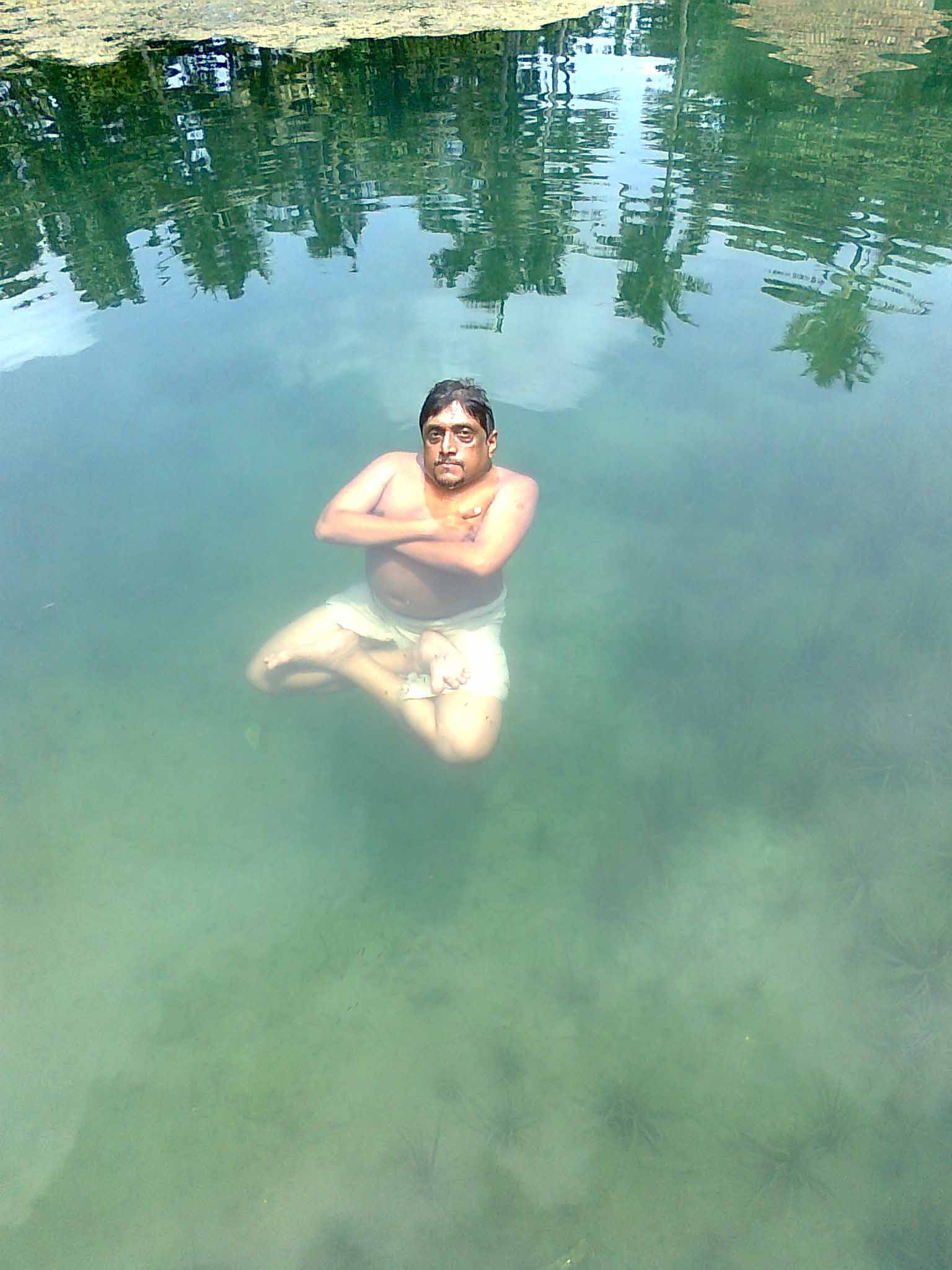 Sit in water - padmasana