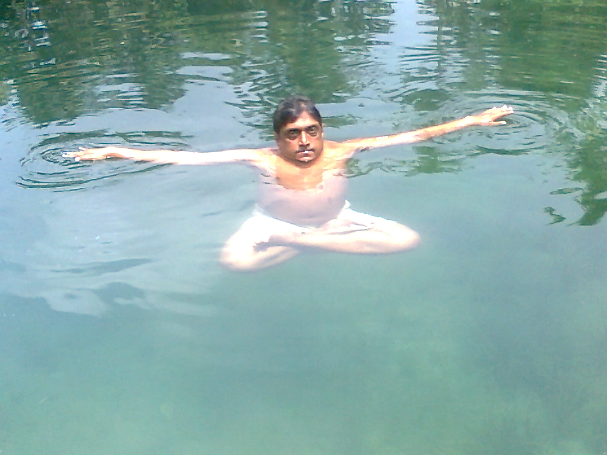 Sit in water - hand stretched